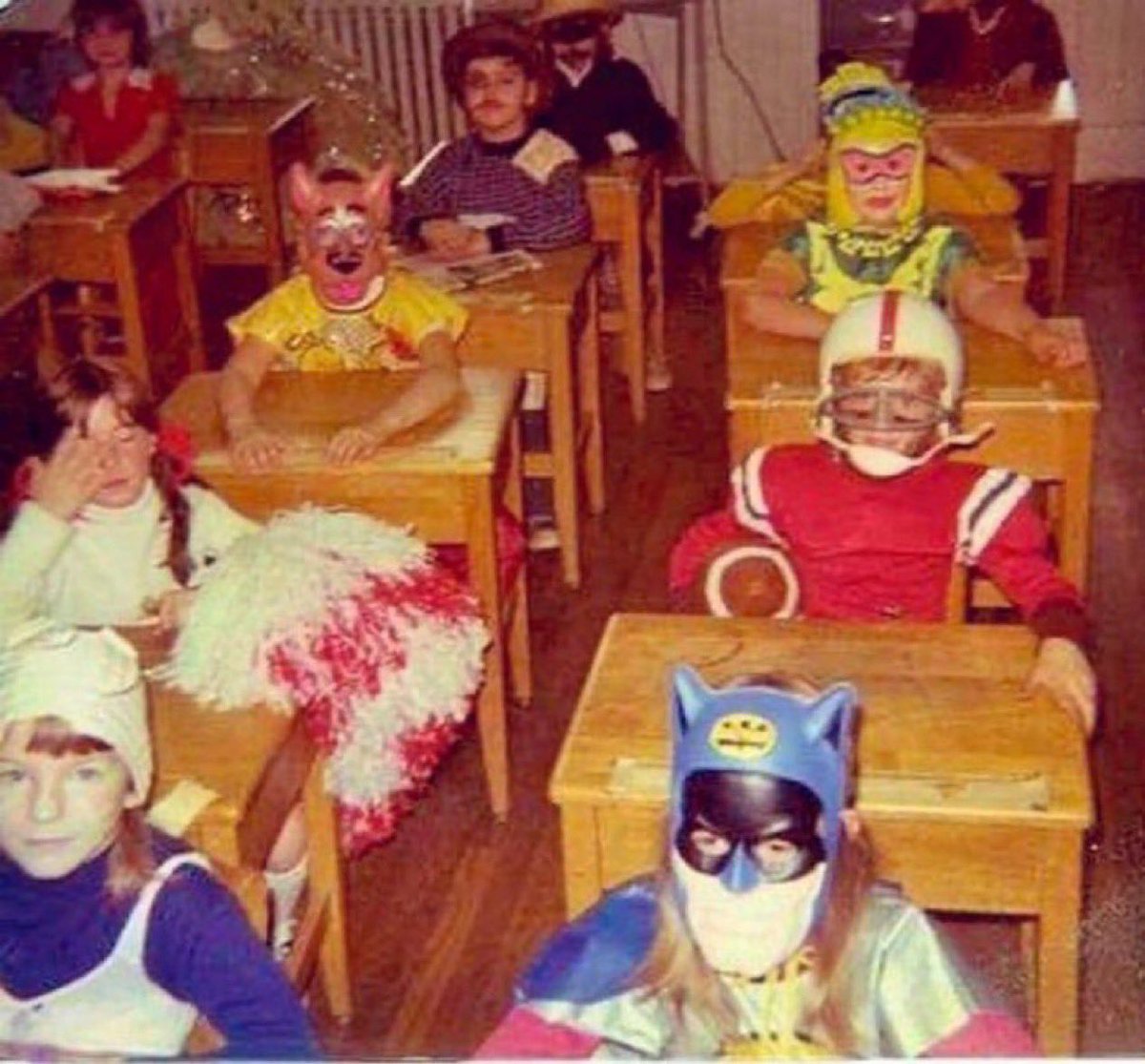 Super70sSports's tweet photo. Remember when you could wear your Halloween costume at school all day long? Just sitting there working on multiplication with your face sweating in 145 degree heat under a mask full of cancer-causing chemicals. Nothing like it. https://t.co/dNIS7dLmta