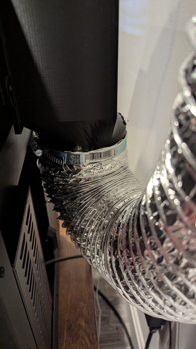 justinszilard's tweet photo. Just to be extra safe, I made a vent adapter for @Prusa3D Advanced HEPA Filtration system. I made an adapter that sits over the HEPA filter and goes to a flexible 4 inch vent. Then the 4 inch vent goes to a old PC fan with its own adapter and that all secured to a wood window insert with a vent hole