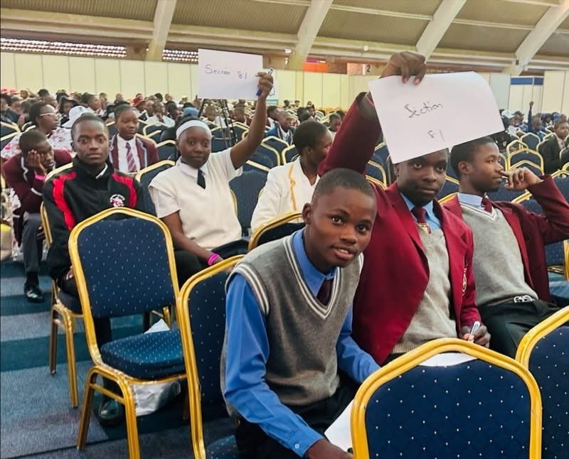 ZITF1's tweet photo. Scholastica Expo 2026 presents Quiz Time, facilitated by Michael Mhlanga! 

Watch top high school minds go head-to-head in a fast-paced battle of intellect, speed, and strategy. Who will take home the title?

#Scholastica2026 #QuizTime #HighSchoolQuiz #AcademicBattle #YouthExcellence