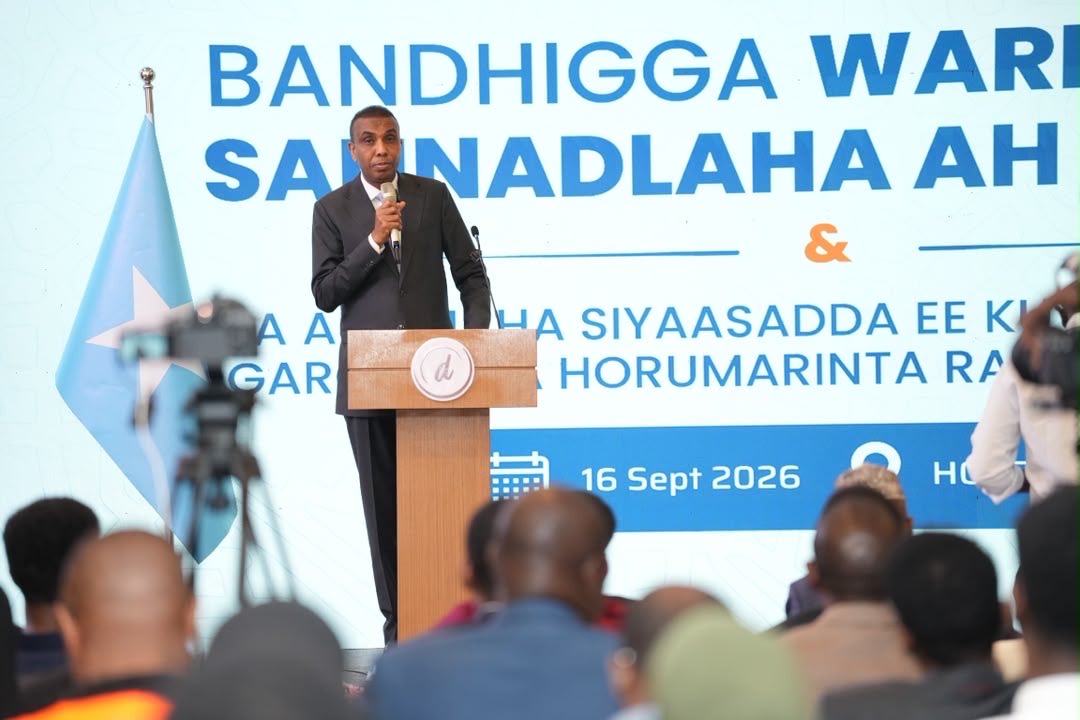 sntvnews1's tweet photo. In his speech at the 2025 Annual Report of the Ministry of Finance, PM @HamzaAbdiBarre congratulated @MoF_Somalia and Minister @BihiEgeh for playing a major role in the sustainable development of the country. He applauded the ongoing progress of economic reforms and urged that it be redoubled to address the challenging external shocks we are facing.