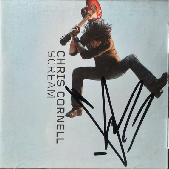 ZeroChance's tweet photo. During the "Scream" Tour I sent Chris an Iron Man movie poster of with him & Vicky on it and mentioned the universal appeal of singing about the sun. I gifted him a printout of it in 2015 and he signed my copy, but I never mentioned "Live To Rise" to see if I had sparked the idea.
I thought I'd see him again, now I have Zero Chances of that. I miss what could have been. I miss Chris...