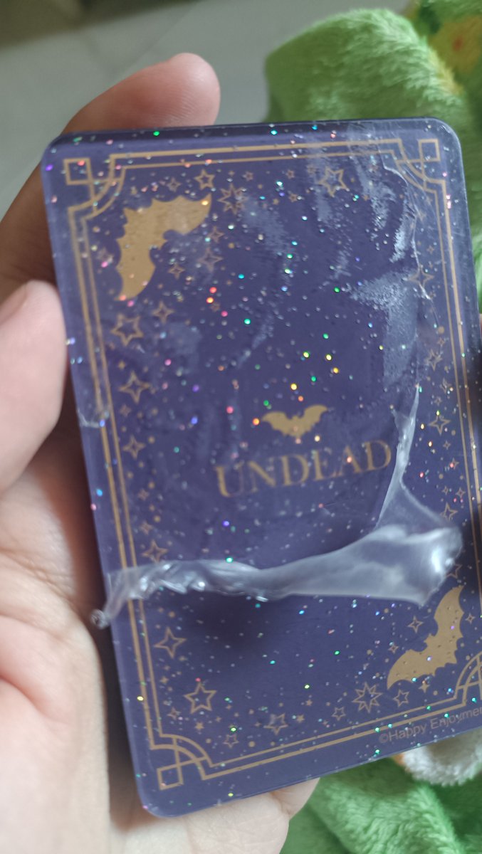 RamblingMoon_'s tweet photo. Just bought merch, but since this is old merch so the plastic were so hard to peel, and in the end I accidentally scratched it, I'm sad now😔 https://t.co/FtrIWZidSX
