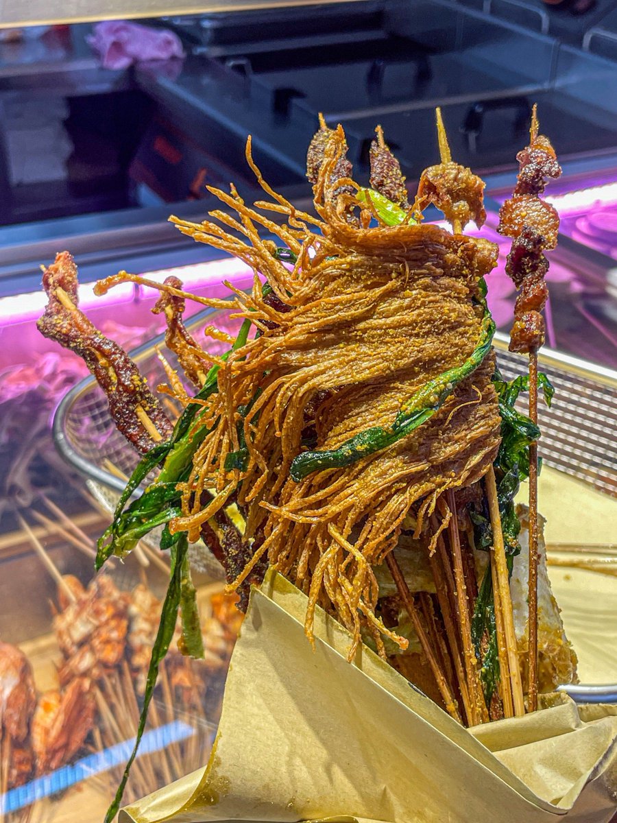 dr_essa's tweet photo. Craving warm street food after a long walk This crispy fried skewer with savory sauce hits different! https://t.co/HR61Q9Rgzc