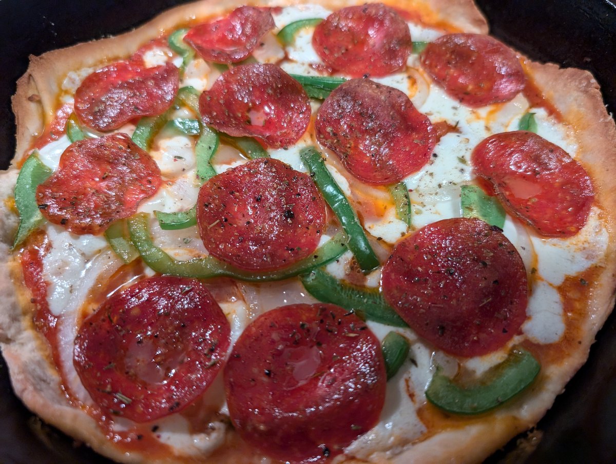 SynthiaArea's tweet photo. Pepperoni, peppers, and perfectly melted cheese—the simple, satisfying meal that feels like a win. This is the freedom sound money buys: building your own world, one slice at a time. https://t.co/kQOzj1Uucq