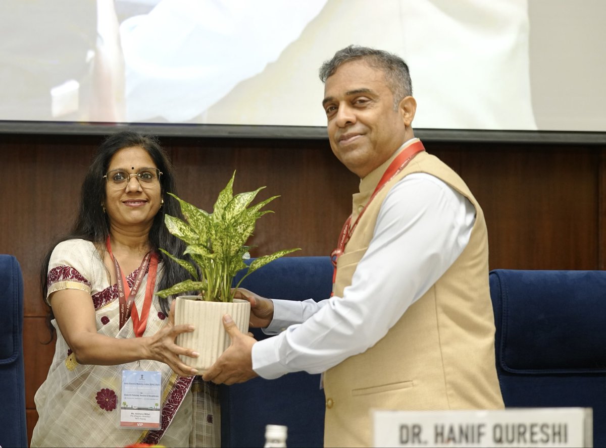 MHI_GoI's tweet photo. Addressing the NITI-State Workshop Series on ‘State EV Policies: Review & Recalibrate’ and the launch of the ‘India Electric Mobility Index (IEMI) 2025’, organised by NITI Aayog, Dr. Hanif Qureshi, Additional Secretary, Ministry of Heavy Industries (MHI), highlighted the ongoing shift towards cleaner mobility, with electric mobility emerging as an important pathway for sustainable mobility. He noted that EVs are driving a silent revolution, with NITI Aayog forecasting a 49% CAGR in EV growth by 2030.

The dignitaries on the dais included Shri Rajiv Gauba, Member, NITI Aayog; Shri Satendra Singh, Secretary, Ministry of Housing and Urban Affairs; Dr. O. P. Agarwal, Distinguished Fellow, NITI Aayog; Smt. Archana Mittal, Program Director, NITI Aayog; Smt. Niharika Rai, Secretary & Commissioner of Transport, Govt. of NCT Delhi; Shri Madhav Pai, CEO, WRI India; and Smt. Trupti Deshpande, Associate Partner & Lead, Energiva Ventures.

The Additional Secretary emphasised that localisation is central to building a resilient and self-reliant automotive ecosystem. Supported by initiatives such as the PLI Auto Scheme, critical components, including traction motors and converters, which were earlier dependent on imports, are increasingly being manufactured domestically. Out of 71 companies in the PLI Auto Scheme, 18 have achieved >50% localisation.

Highlighting the growing adoption of electric buses, he noted that State Transport Undertakings are targeting 50,000 e-buses, alongside increasing adoption by private operators. He also underscored the importance of charging infrastructure as a key enabler of EV adoption. India currently has around 67,000 chargers, including about 24,000 fast chargers. Under the PM E-DRIVE Scheme, Rs. 2,000 crore has been allocated for charging infrastructure. Proposals for 7,254 EV public chargers amounting to Rs. 729.34 crore have been sanctioned to 3 OMCs (IOCL, BPCL & HPCL) and 10 States to support charging infrastructure, with other States encouraged to submit proposals.

#MHI #NITIAayog #IEMI2025 #ElectricMobility #EVPolicy #PLIAUTO #PMEDRIVE 

@DrQureshiH @NITIAayog @MoHUA_India @nihar15aug @OPAgarWRI @madpai @WRIIndia