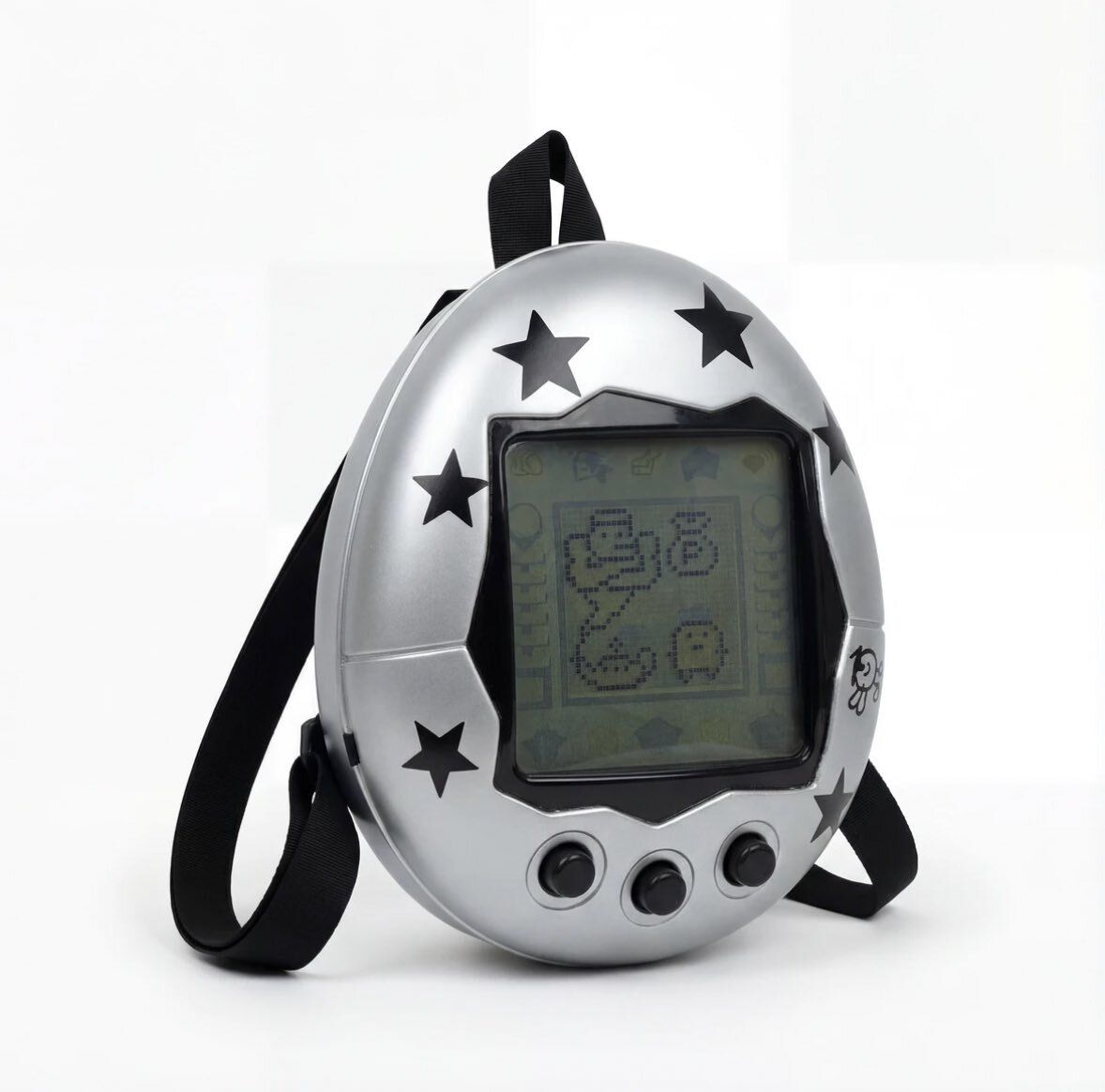rogue's tweet photo. This Tamagotchi egg backpack has a retro pixel screen design that brings nineties virtual pet nostalgia straight to your outfit https://t.co/mra5LEGZyS