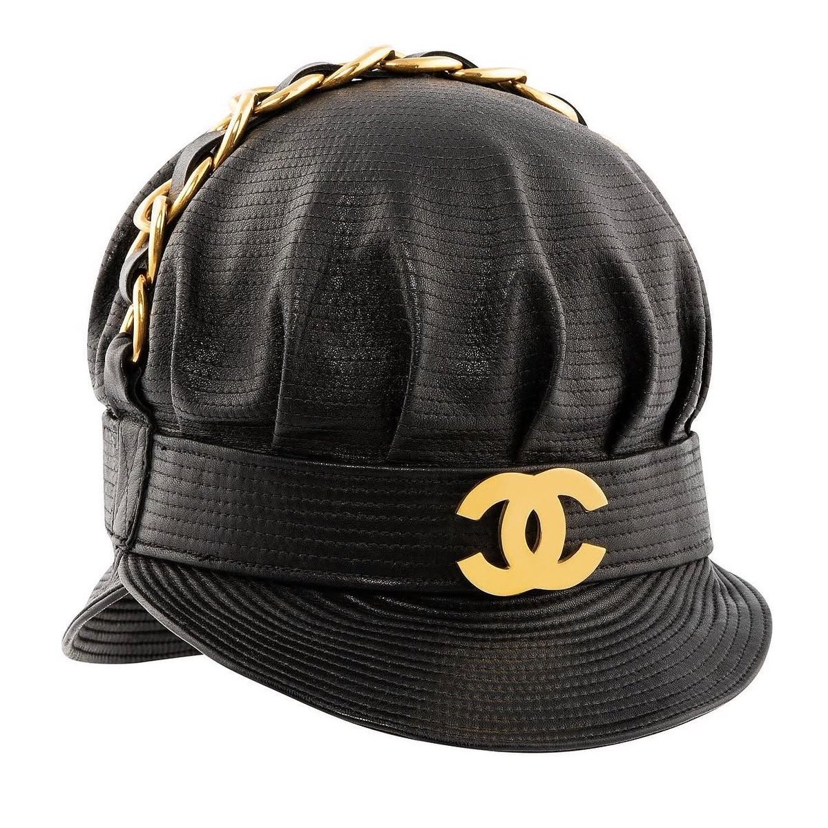 Sound_Scrape's tweet photo. Rihanna wearing a FW91 Chanel Biker Hat by Karl Lagerfeld. https://t.co/rVf9v1pTOJ