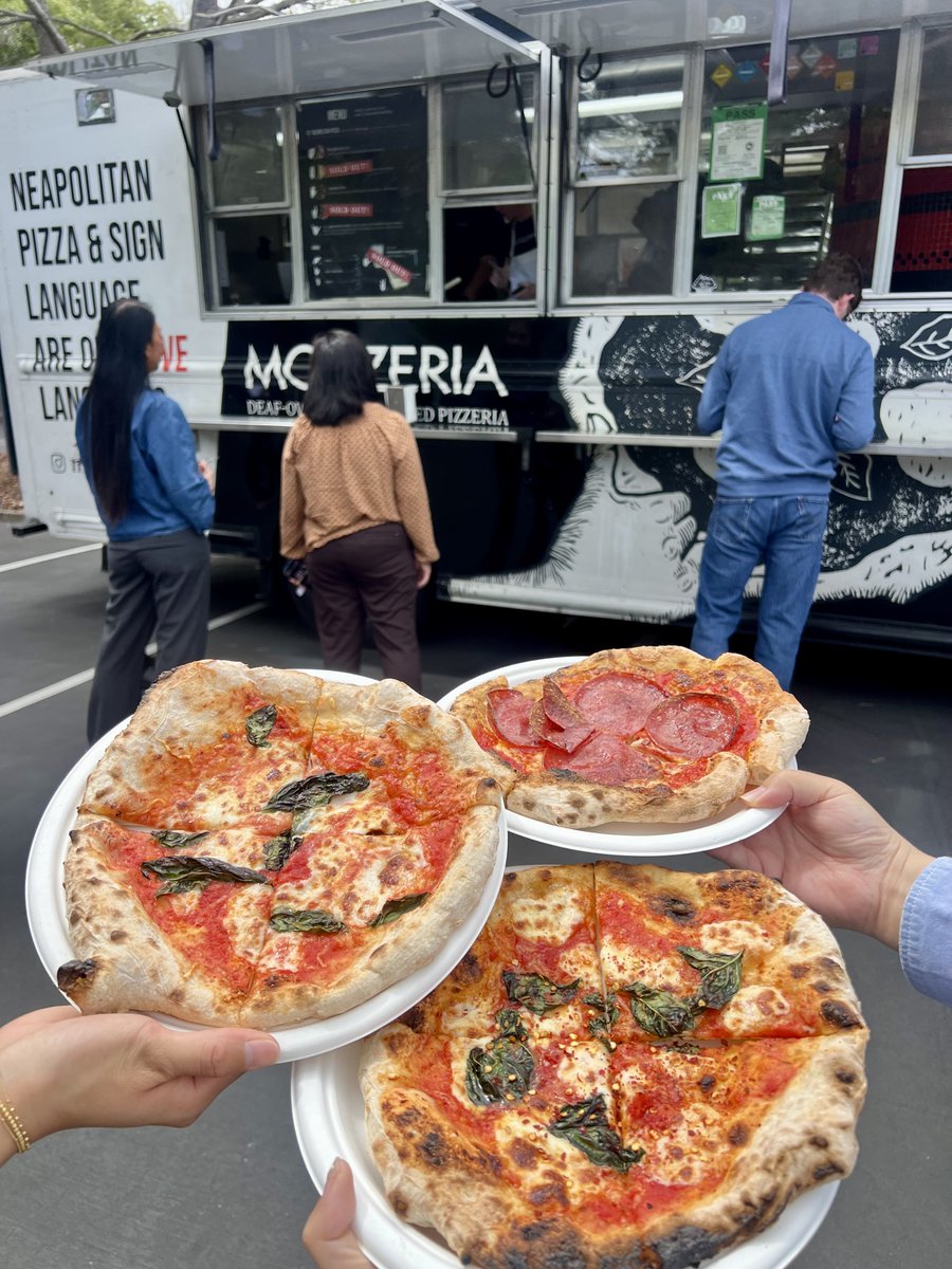 ChronoScaleCorp's tweet photo. Pizza with a purpose. 🍕🤟
The ChronoScale team enjoyed lunch with Mozzeria, a Deaf-owned and operated pizzeria serving up wood-fired Neapolitan pizza—with a little ASL along the way.
Great food. Great people. Great afternoon.
#LifeAtChronoScale #DeafOwned #ASL #InclusiveBusiness #Community #CompanyCulture