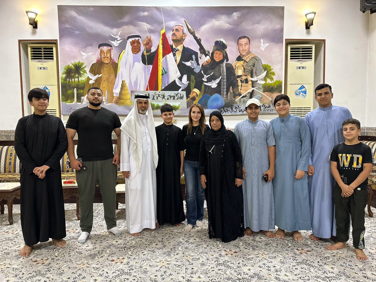 ALavrina's tweet photo. Upon arriving in #Tikrit, I could not miss the opportunity to visit the home of Umayya al-Jabara — a woman who became a symbol of courage and resistance to ISIS in #Iraq.
As it happened, that day the family was celebrating her eldest son’s graduation from a military academy. The house was filled with guests. In keeping with local tradition, the men and women sat separately, and I joined the women of the family. From the very first moment, they surrounded me with warmth and care, offered me food, told me about Iraq, and showed a sincere interest in #Azerbaijan and our people.
It was #Umayya’s husband who spoke most about her. He remembered her not as a national heroine, but as the person closest to him — a woman, a wife and a mother. Umayya was killed by a sniper in December 2014, leaving behind four sons. When I asked her husband what Umayya’s recognition as a sheikha meant to him, he replied with a single sentence: “It means everything.”
Today, each of her sons is choosing his own path. The eldest has graduated from a military academy, while another dreams of earning a master’s degree, travelling the world and visiting China one day.
I came to this home to hear Umayya’s story, but the house spoke not only of the past. It also told a story of life continuing through the destinies and dreams of her sons.