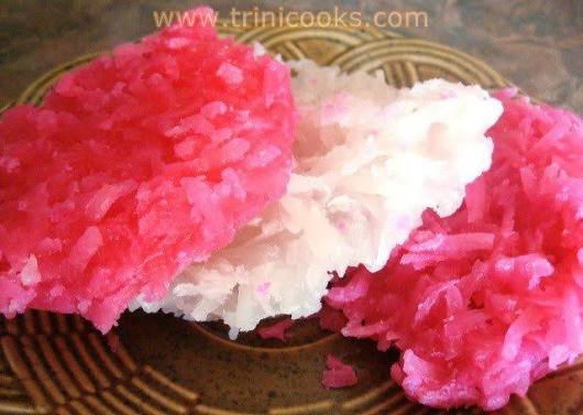 got_cake's tweet photo. Do you know what this is?
The sweet traces its history back to the 17th and 18th centuries during the proliferation of sugarcane plantations across the Caribbean, especially islands like Barbados 🇧🇧  and Tobago 🇹🇹.

Enslaved Africans and their culinary innovation combined abundant local ingredients—such as indigenous coconuts—with the byproducts and surplus of sugar production to create affordable, long-lasting, and nourishing treats.
 Passed down through generations, the recipe became a staple of Caribbean culinary heritage and a nostalgic favorite for schoolchildren across the Caribbean.
This is cultural legacy and is found in an array of colors wherever sugarcane was a king crop.

What do they call this in your favorite Caribbean region?