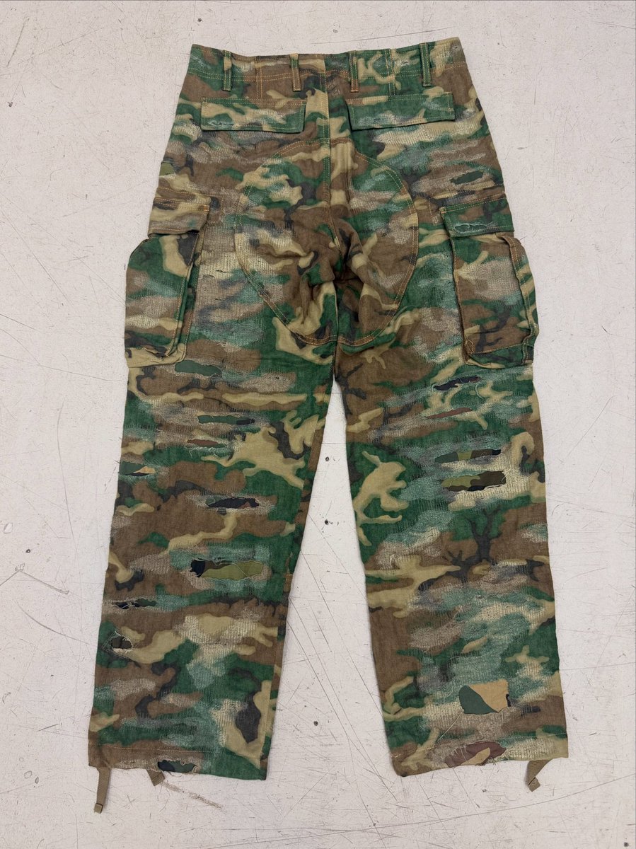 theattractmag's tweet photo. givenchy AW2023 sample boro camo pants by matthew williams https://t.co/ihk8WOPfht