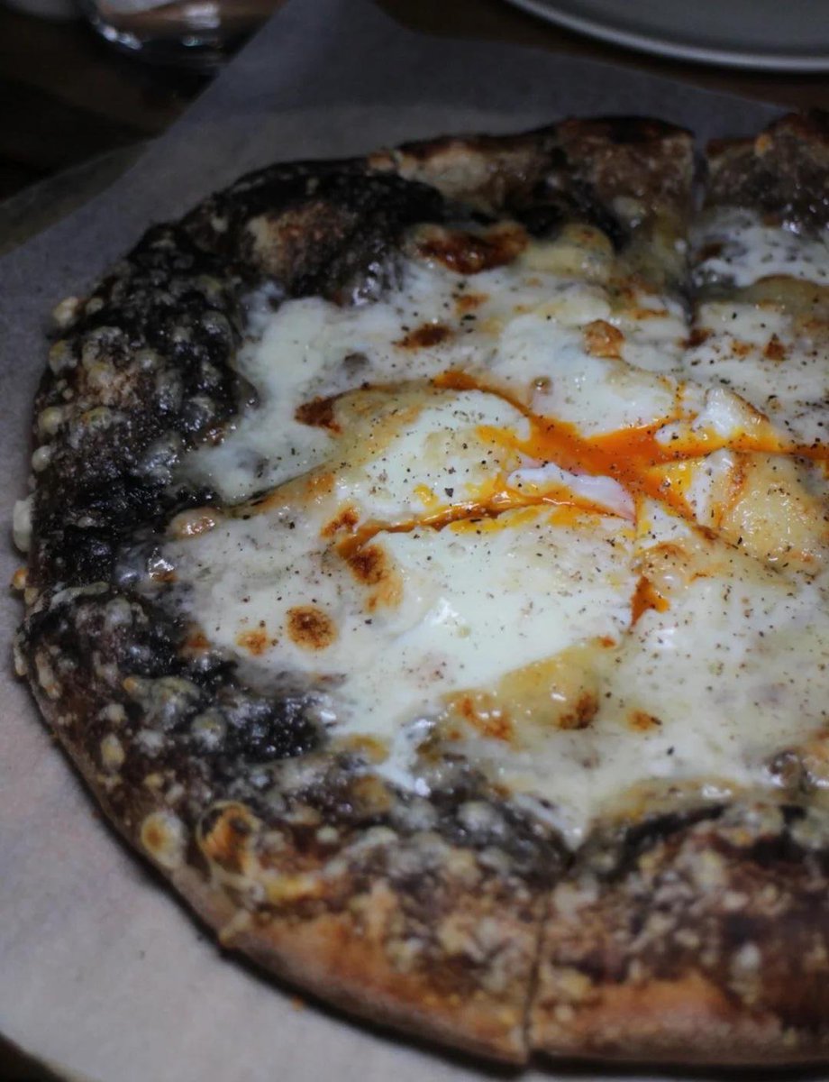 fu11m00nHUH's tweet photo. Just had the most insane truffle mushroom pizza at that tiny neighborhood spot on 5th St! Crispy crust, oozing cheese, and that earthy truffle flavor 10/10 will be back tomorrow. https://t.co/kpg5IAmMjt