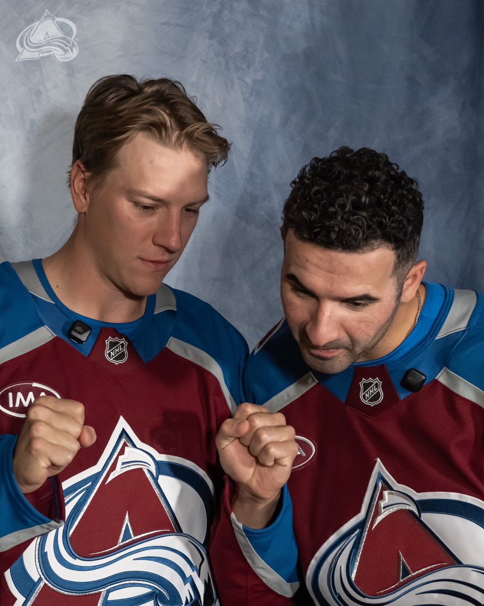 Parker Kelly and Nazem Kadri nothing inspecting something off camera with Parker’s hands up in “hopes”