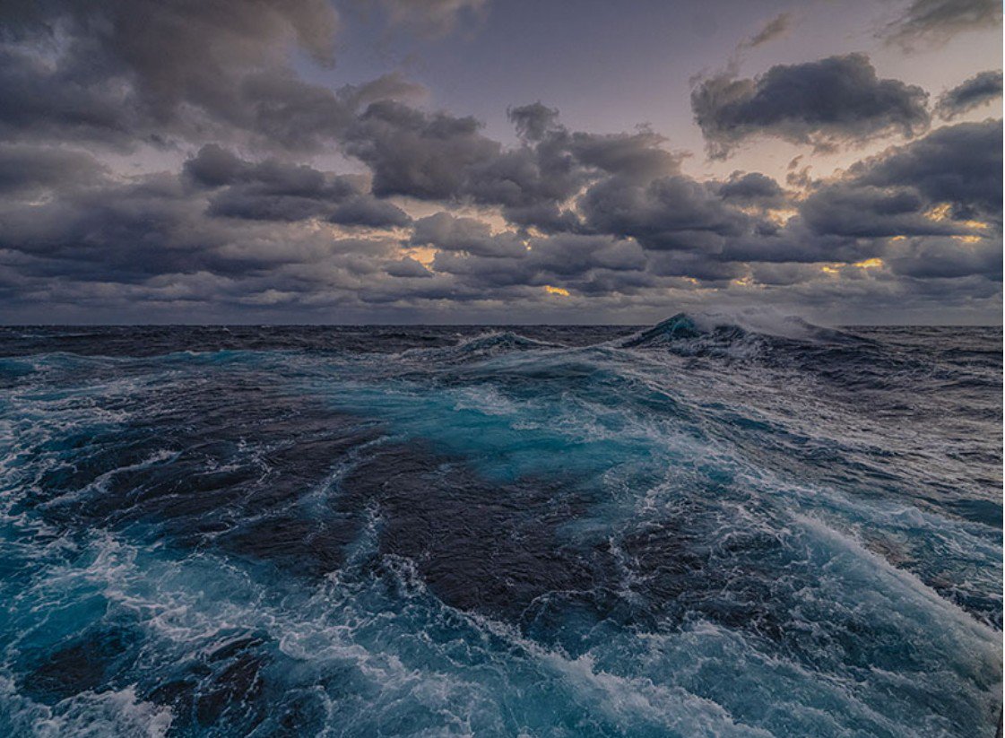 PeterDClack's tweet photo. Earth's climate has always been in a state of steady, endless imbalance, flux, and readjustment. This is almost entirely due to the constantly flowing, tidal vastness of the oceans.

The world's five interconnected oceans loom as a source of mystery. While scientists have mapped the surface of Mars and the Moon, 80% of the oceans are unmapped, and are among the greatest unknowns on Earth. A majority of people can only gaze out at the ocean horizons stretching around the globe or walk in the shallows along the coast. 

That is all most people ever see or experience.

The ponderous, orderly, ceaseless, and silent underworld movements of deep ocean waters are built upon the planetary memories of a 4.6-billion-year history. Almost nothing in this ocean world changes quickly.

The melting of vast glacial ice caps over the northern landmasses as the planet warmed after 19,000 years ago took the best part of 9,000 years. Oceans rose 120 meters globally, with sea levels climbing at an average rate of approximately 13.3 millimeters—about 1.33 centimeters—each year (or half an inch).

This was the warming phase into today's 11,700-year-long warm interglacial, the Holocene, merely one cycle in a global glacial reign that has lasted 2.58 million years. Our planet rebalanced itself from icehouse conditions without our permission or help. This planetary-scale de-icing has defined more than 40 similar shifts from an icehouse world to the warm, habitable, and fluctuating environments that characterise much of the Age of Mammals.

The world's five interconnected oceans are the overwhelming measure of Earth's capacity to retain heat and offset perpetual ice ages. It's pure physics. Because water covers nearly three-quarters of the planet (72%), the world is shielded from extreme temperature swings. Land heats and cools rapidly, but the massive, deep mass of the ocean acts as the ultimate planetary buffer zone. 

Oceans contain roughly 90% of all the world's retained heat, while the atmosphere retains less than 1%. Water has an exceptionally high specific heat capacity, meaning it can absorb massive amounts of thermal energy with only a slight increase in temperature.

The movement of tropical warm waters to the Northern Hemisphere is driven by the Atlantic Meridional Overturning Circulation, part of a global ocean conveyor belt circulating on thousand-year cycles. Warm surface waters work their way north, releasing heat into the atmosphere as they reach places like Western Europe. 

As a result, the UK and Scandinavia are significantly warmer and more habitable than other areas at the exact same latitude, such as Canada or Siberia—homes to endless tundra, peat bogs, icy, frosted biomes, and ghostly, empty treescapes.

Waters deeper than 200 meters cover 66% to 90% of the total ocean environment, spreading across most of the non-land surface area. The average ocean depth is 2.3 miles, and the deepest point—the Challenger Deep in the Mariana Trench—reaches nearly 11,000 meters, deeper than Mount Everest is tall.

These great ocean waters combine with water vapor, clouds, storms, winds, and solar cycles to ceaselessly redistribute heat. It isn't just a water blanket—it's a massive, continuous phase-change engine that moves heat from surface to sky through evaporation, condensation, and cloud cover, reflecting sunlight back into space before it ever hits the deck.

The top three meters of the ocean hold as much heat energy as the entire atmosphere above it. Yet we think we understand the fine machinery of the world's climate.
The oceans are so vast that their sheer mass prevents the atmosphere from warming at a runaway pace. 

The misconception is that thermal transport is primarily atmospheric. If that were true, global air temperatures would be drastically higher than they are today.

Meanwhile, CO₂ makes up roughly four-hundredths of one percent of the atmosphere, playing its vital, priceless role in photosynthesis and the green web of life.