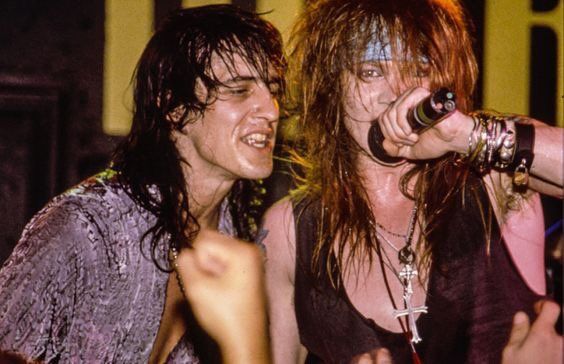 crockpics's tweet photo. Axl Rose and Izzy Stradlin at the legendary Marquee Club in London in June 1987. Playing their very first shows outside America, Guns N' Roses crossed the Atlantic to play a three-night residency in Soho just weeks before Appetite for Destruction hit record store shelves. Photographed against the stage by Ross Halfin.

 🎸 The June 1987 Marquee Club shows gave London fans a chance to experience Guns N' Roses in a tiny, packed room right before they blew up into stadium giants. If you could see any legendary rock band in a small club just before their breakthrough, who would you choose? 🎸 👇️