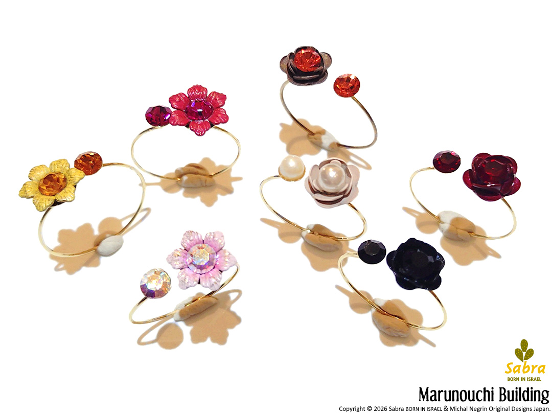 MichalNegrinJPN's tweet photo. 可憐なお花が指先に咲いたコイルリング🌼🌹🌸
秋冬にオススメな赤オレンジや、肌なじみの良いピンクベージュなど、単品付けから重ね付けまで楽しめるカラーでご用意しています🎵

サブラ＆ミハエル ネグリン丸ビル店

📱LINEでのお問い合わせもお気軽に😊 https://t.co/f339J2XKHd