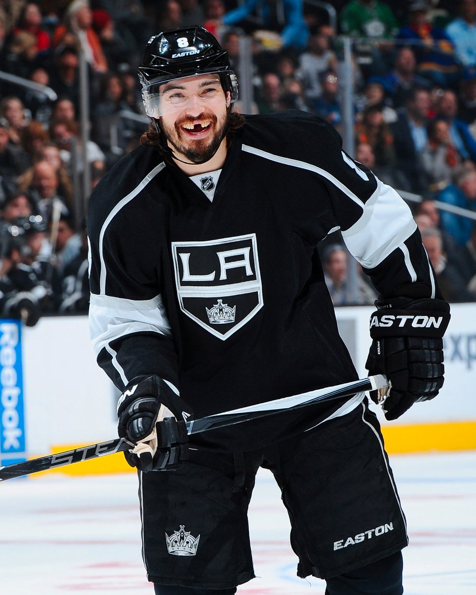 Drew Doughty smiling on ice in a Kings uniform