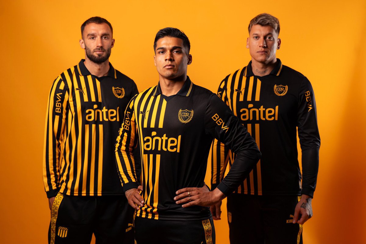 TheShirtUnion's tweet photo. 🟨⬛️| @OficialCAP 135th Anniversary Shirt

Paying homage to the designs and crest from their first season as the Central Uruguay Railway Cricket Club (CURCC). https://t.co/GVwkbt02Bz