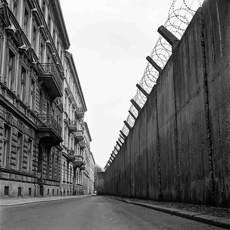 HistoryWJacob's tweet photo. Almost every wall in history was built to keep enemies out.

The Berlin Wall was built to keep a country's own people in.

By 1961, socialist East Germany was losing its people. An estimated 2.5 to 3 million had walked out to the free market West since 1949. Nearly one in six citizens.

Doctors, engineers, teachers, the young. Given a free choice, they chose against the socialist system.

But instead of giving its people freedom, the ruling Socialist Unity Party chose the opposite.

Overnight on August 13, 1961, it sealed Berlin. Barbed wire, then concrete, guard towers, dogs, a raked "death strip," and the Schießbefehl: the order to shoot anyone attempting to leave.

The Wall stood 28 years. At least 140 people were killed trying to reach the other side of the same city. Some were teenagers. Some were left to bleed in the no-man's-land while guards watched.

Then on November 9, 1989, it fell. Less than a year later, Germany was one country again.

East Germany was opened to free markets and private enterprise. Within a generation, incomes, goods on the shelves and freedom of movement were realized again.