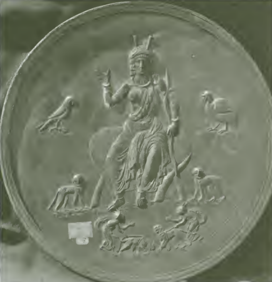 Schandillia's tweet photo. One of the two oldest personifications of India, more than 1,300 years older than Abanindranath Tagore’s Bharat Mata. It’s a silver dish, made sometime in the 6th century AD, that was discovered at Lampsacus, an ancient Greek city in what’s now Turkey.

At its center is a woman identified as the Personification of India, seated on a chair the legs the legs of which are elephant tusks. She holds a bow in one hand and raises the other in a gesture of benediction. She is surrounded by animals associated with India (a parrot, a monkey, a panther, and a tiger) while two turbaned attendants stand below. The dish was richly decorated with gold and black enamel.