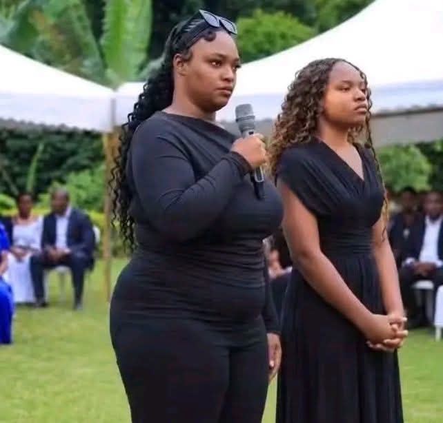 georgediano's tweet photo. The real story behind these two daughters of Agrippina who have been trending for throwing their hands in the air like they don't care at their father's funeral is that their mother abandoned their father when he was sick. The old, sick man was taken in by his first family and relatives. Both ladies are from the second wife, and it's said Mwendazake abandoned the first wife for over 28 years. 

He only came back after being kicked out by the second wife. After the mother of these two Mikoras finished eating his money eat kisumoo, she abandoned him, especially now that he was becoming a burden with sickness and couldn't take care of himself.

The mother of these two pikiins dumped him at the goat wife's hacienda and disappeared, citing that hawezi panguza mtu mzima mavi. Unfortunately, the mzee kicked the famous bucket, and the first family and extended relatives got busy planning the final send-off.

Despite Mwendazake disappearing for over 28 years, the first family decided to take him back and took care of him for over 3 years. Mzee was an employee of KPLC, and the second wife had already taken over Mzee's pension. They never visited him until his demise.

On the big day when Mzee was to be escorted to Paradiso State lodge located along Sayuni Lane, these two daughters of Agrippina and their mother appeared donning black dresses, gogos, and speaking English of the nose as they pointed at chicken sufurias, ordering caterers to serve them imondoi, steak, and other nice chicken pieces.

When the daughters of Agrippina were given a chance to eulogize their father, they went on an insult spree, throwing insults at their uncles, aunties, and villagers. What these Mikoras don't know is that your immediate family may forget this and move on, but your relatives, villagers, and society will never forget your words. 

Silence is power. But just from the look of things, you can tell the lady ni mauru... she looks like those women who can serve you Pishori a good one when you leave your drink unattended in a club. May Yehova Wanyonyi remember his poor pipoos in that thing called Mareej. Kama kawa sisi walala hoii hatuna maoni, Letu Jicho tu.👀