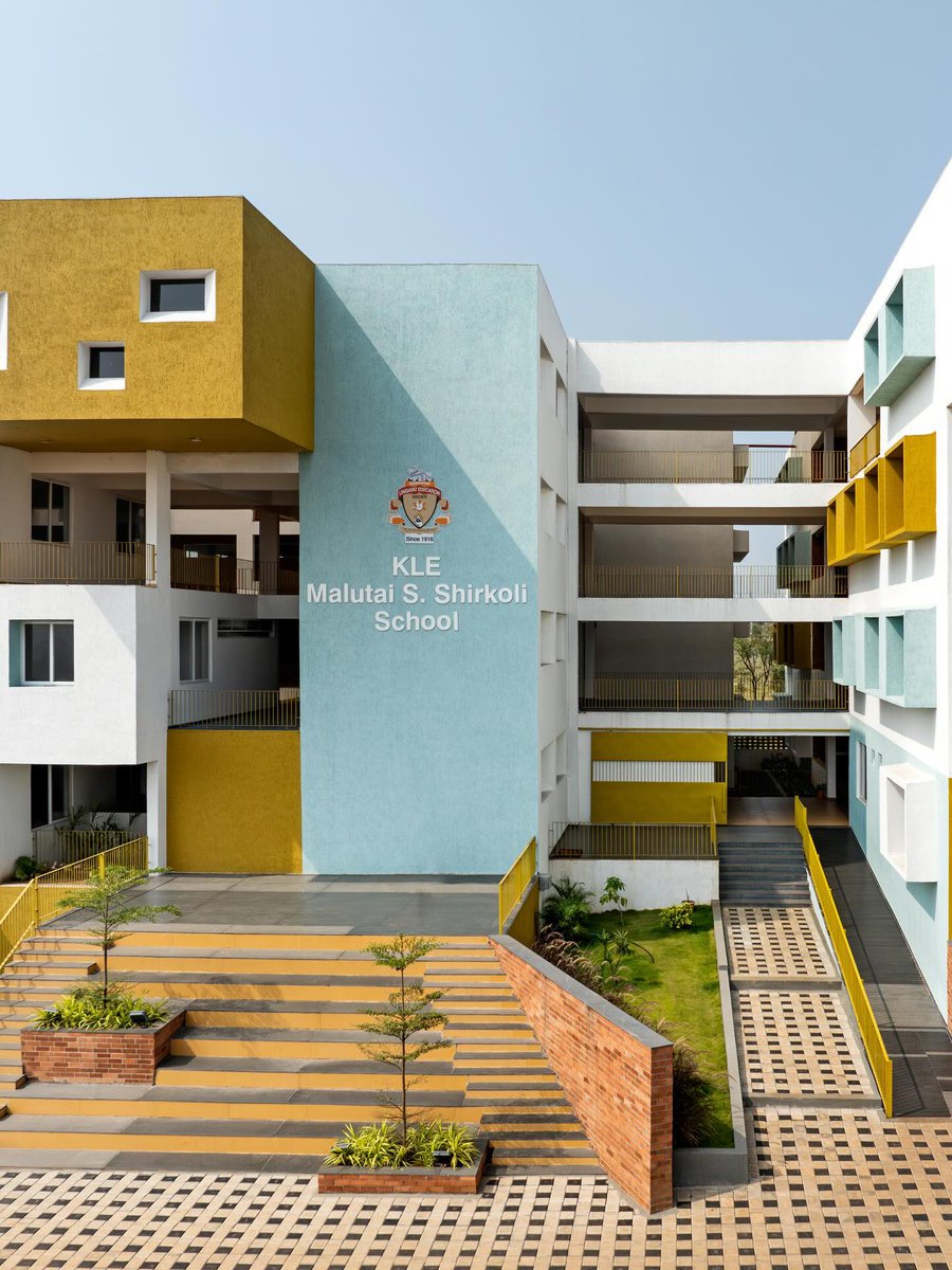 TopeDada17's tweet photo. Still on school designs 

This is the KLE school, Sankeshwar
This school's facade redefines educational architecture using dynamic forms and vibrant accents to create an inspiring space for kids.

Designed by shreyaspatilarchitects https://t.co/jMyzg9khaK