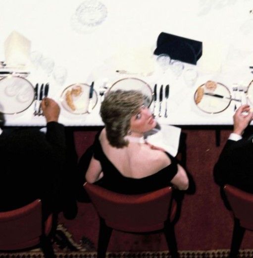 pedestrian's tweet photo. Princess Diana looking back at a dinner in 1986 is still one of her coolest candid moments ever https://t.co/7IPMSrAaAv