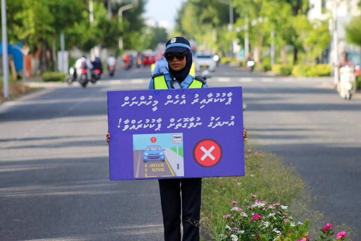 PoliceMv's tweet photo. Our officers from Hulhumale Police conducted a silent campaign to raise awareness about road safety this morning along Nirolhu Magu in Hulhumalé Phase 2.

Using simple yet impactful messages displayed on placards, the officers urged road users to drive safely, remain vigilant, and contribute to accident prevention.

A few seconds of caution can save a life. Let’s work together to make our roads safer. after together.