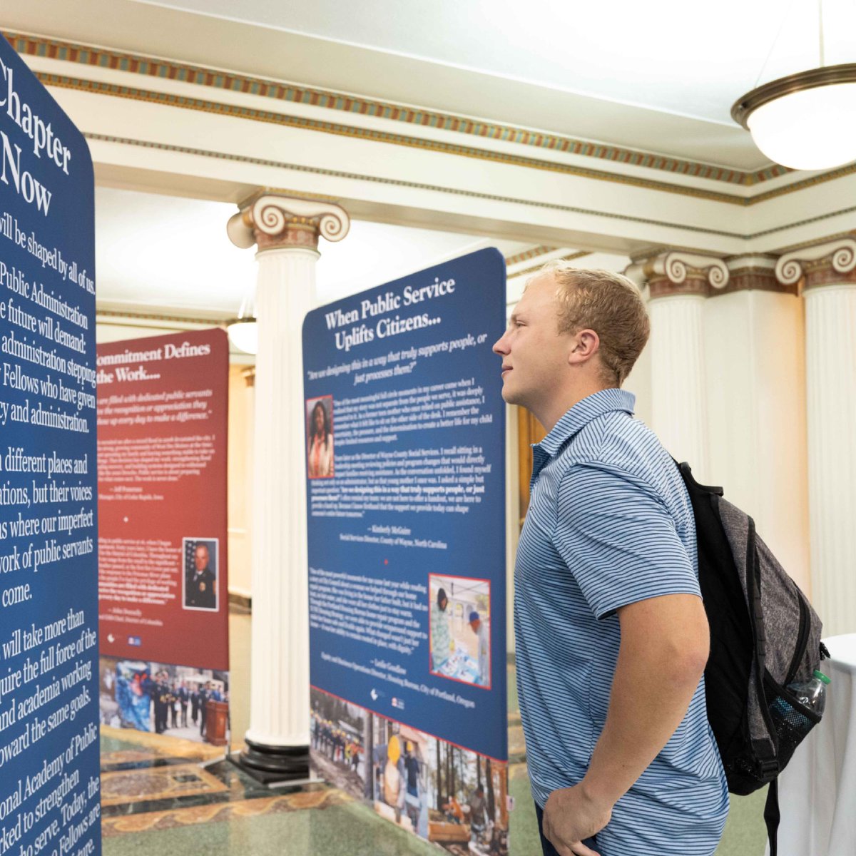MaxwellSU's tweet photo. A new exhibit at Maxwell celebrates the people behind public service. “The Promise of Public Service,” created by @NAPAcademy, “puts faces and names to the people who actually make government function day to day,” says alumnus Wally Bobkiewicz.

https://t.co/J8F4gXfFMS https://t.co/eIXPMiz9fq