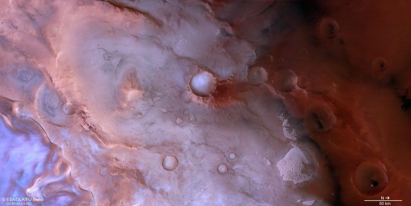 earthskyscience's tweet photo. This unusual purplish terrain lies near #Mars' south pole. ESA’s #MarsExpress orbiter captured this view of the ridge #ThylesRupes. At the center is an ice-filled crater, with frost-covered sand dunes at lower right. 🔴🟣

https://t.co/9jESktPboL

📸 ESA/ DLR/ FU Berlin. https://t.co/N9YCUfAdcf