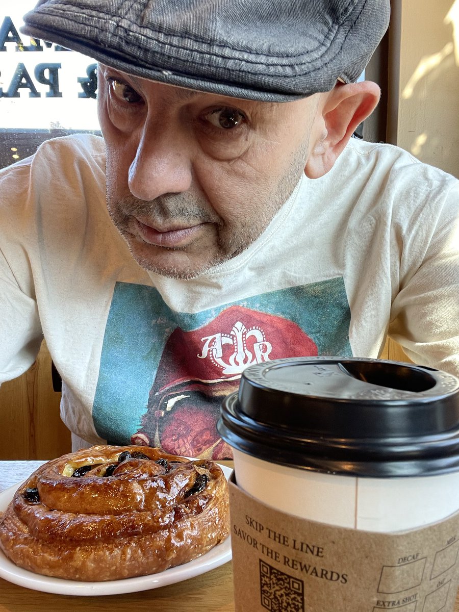 SimonMajumdar's tweet photo. #simonstares at a treat for myself after another medical visit. @sweetwheat__  A Pain aux Raisins plus a hot chocolate. Just what I needed. https://t.co/t5OmJ7vkSR