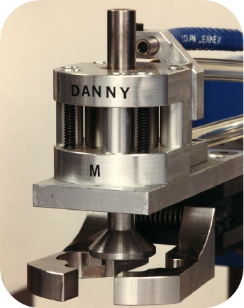 KCNSC's tweet photo. This KCNSC robot was named “DANNY M.” after University of Kansas basketball star Danny Manning, who led the Jayhawks to a national championship in 1988. The robot punched parts and made a slam-dunk motion during operation. #TBT #doworkthatmatters https://t.co/5oLj6kP4sJ