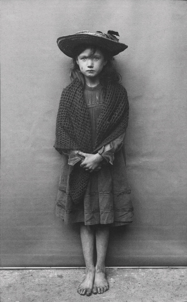 janeyellene's tweet photo. This little girl is Adelaide Springett, one of Horace Warner’s Spitalfields Nippers, photographed around 1901 when she was eight years old.

Warner pictured Adelaide in what he called “all her best clothes”, but she was barefoot. Her boots were in such a terrible state that she was too embarrassed to wear them for the photograph. Warner also photographed them and tagged them “Little Adelaide’s best and only boots.”

Adelaide knew real poverty. In 1901 she and her mother were living in a Salvation Army shelter in Hanbury Street, Spitalfields.

But the barefoot little girl survived those desperately hard beginnings. Adelaide lived until 1986, reaching the age of 93.

Two photographs that tell an extraordinary story of childhood poverty, and survival.

 #EastEnd #SocialHistory #EdwardianLondon