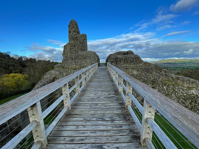 CastlesBritain's tweet photo. I crossed one little bridge and understood Montgomery Castle
I’ve just been wandering around Montgomery Castle in Powys, and I stopped halfway across this wooden footbridge instead of hurrying into the ruins.
Looking down into the rock-cut ditch made the whole castle suddenly make sense. This narrow ridge was divided into successive defended areas, so reaching the heart of the castle meant getting through one obstacle after another.
It’s such a simple detail, but it turned scattered walls into a place I could actually picture working. I had to share this beautiful little approach — sometimes the ordinary route in tells you more than the grandest tower.