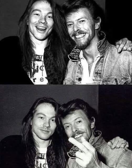 historyrock_'s tweet photo. The day Axl Rose punched David Bowie.

In October 1989, at the Cathouse club in Los Angeles, Guns N’ Roses was filming scenes for the “It’s So Easy” music video when David Bowie showed up with Ola Hudson, Slash’s mother and the British musician’s ex-partner. Drunk, Bowie began flirting with Erin Everly, Axl Rose’s girlfriend and the inspiration for “Sweet Child O’ Mine.”

Axl lost it, he jumped off the stage, punched Bowie, and chased him down the street, shouting threats. Riki Rachtman, the club’s owner, later recalled the surreal scene of watching a rock legend flee from Axl’s fury.

Days later, while Guns N’ Roses was opening for the Rolling Stones at the Los Angeles Coliseum, Mick Jagger and Eric Clapton playfully teased Axl, confirming that Bowie tended to lose control when he drank too much. Shortly afterward, David invited Axl to dinner to apologize, sealing the peace between two rock legends.