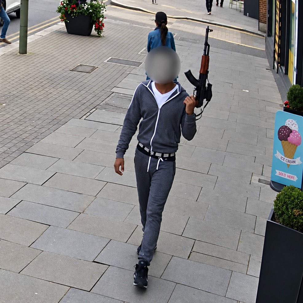 NickTenconi's tweet photo. Man caught walking through Edgware with what appears to be an assault rifle?

Maybe this is why the Met Police banned my party from marching through Edgware because of the multicultural element. https://t.co/6QnIenKTUb