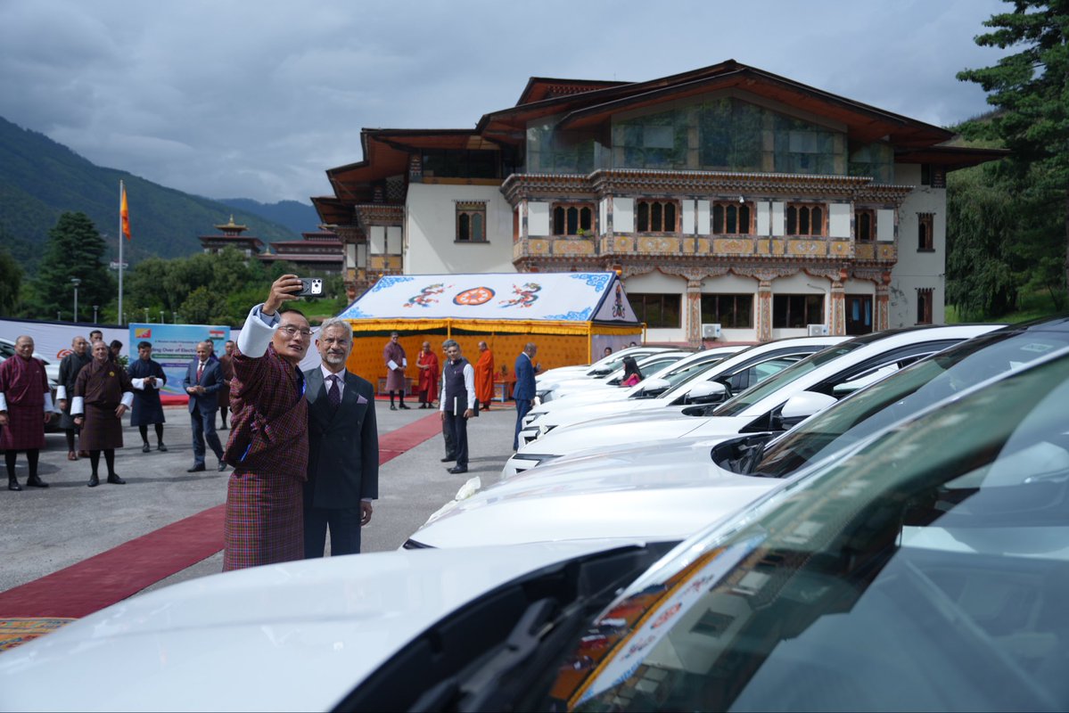DrSJaishankar's tweet photo. Delighted to hand over 54 ‘Made in India’ electric vehicles to PM @tsheringtobgay. 

India is supporting Bhutan’s advances towards e-mobility and sustainability transport. 

🇮🇳 🇧🇹 https://t.co/RjgtftUzI2