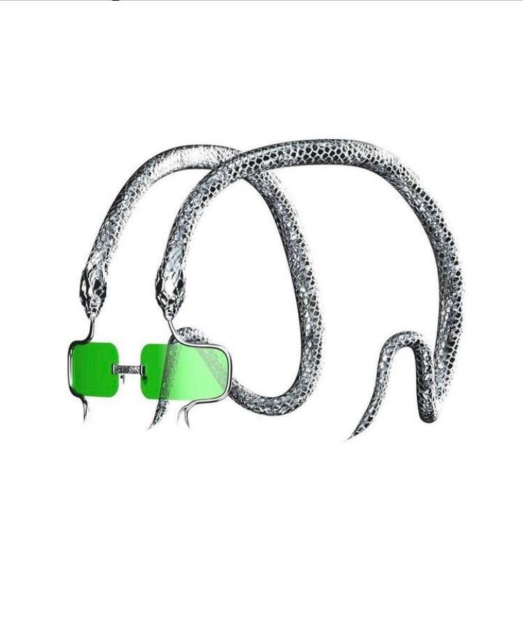 rogue's tweet photo. I love how the metallic serpents on the GuiFou Snake Overhead Eyewear wrap over the head to hold those green lenses https://t.co/e31rF2fDhK