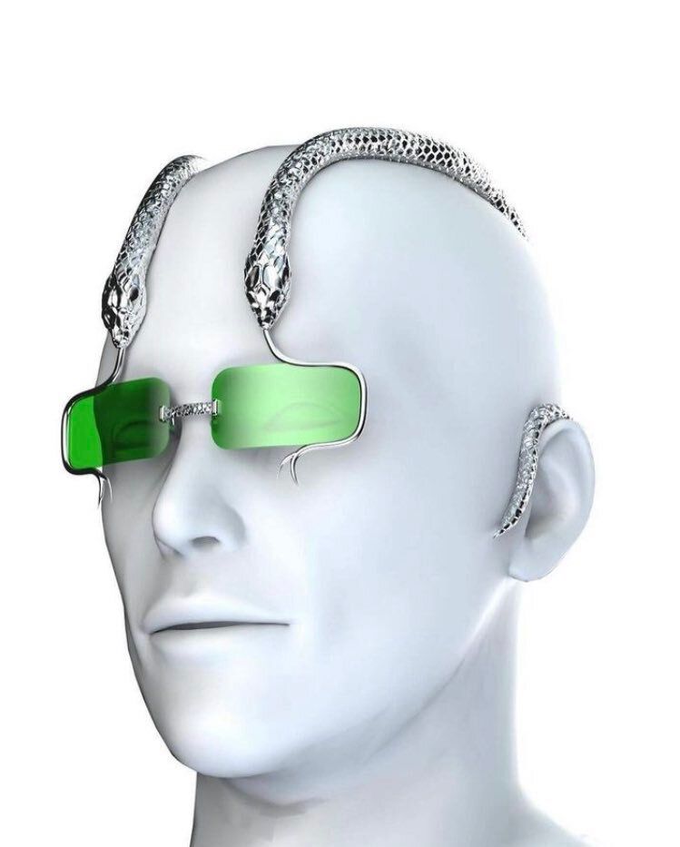 rogue's tweet photo. I love how the metallic serpents on the GuiFou Snake Overhead Eyewear wrap over the head to hold those green lenses https://t.co/e31rF2fDhK