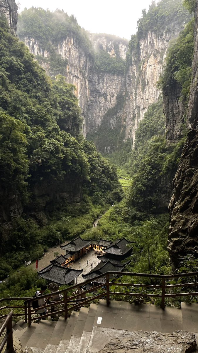 paul_doub's tweet photo. today i visited the Three Natural Bridges in Wulong, China.

absolutely unreal place. it looks straight out of a movie, and Transformers: Age of Extinction was actually filmed there.

this is one of my favorite things about China: staying in a huge city, then taking an hour-long train ride out to Wulong for a day somewhere like this.

on the way there, i worked from my phone with @bot. planned the next few days, handed over my dev tasks, and got everything running. then i went exploring.

by the return journey, the builds were deployed and the @vercel preview links were waiting for me. i spent the train ride testing them and sending feedback, all from the same phone.

the @bot integration with @cursor_ai makes this feel surprisingly simple. the agents have their own computers in the cloud, so they can keep working while i’m out walking around.

this is exactly what i want from the AI setup i’m building: more days like this.

thanks for everything @SpaceXAI