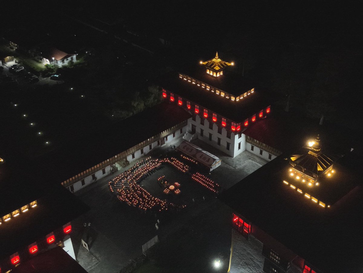 DrSJaishankar's tweet photo. The ‘Aashirvaad ka Diya’ was lit at the iconic Tashichho Dzong in Thimphu in the gracious presence of His Majesty The King Jigme Khesar Namgyel Wangchuck.

We paid tribute to Prime Minister @narendramodi’s 25 years of committed Janseva, which has impacted countless lives globally. 

We were joined by Prime Minister @tsheringtobgay, @FMBhutan D. N. Dhungyel, friends of India from Bhutan and the Indian community in this special moment.