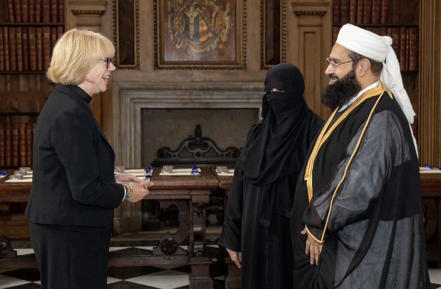 BrickmanErik's tweet photo. As a Catholic, I have seen priests from India, Nigeria, and many other countries.  You know what I haven't seen, an archbishop giving an award to a Cleric linked to Osama Bin Laden! https://t.co/YFBXNav0rK