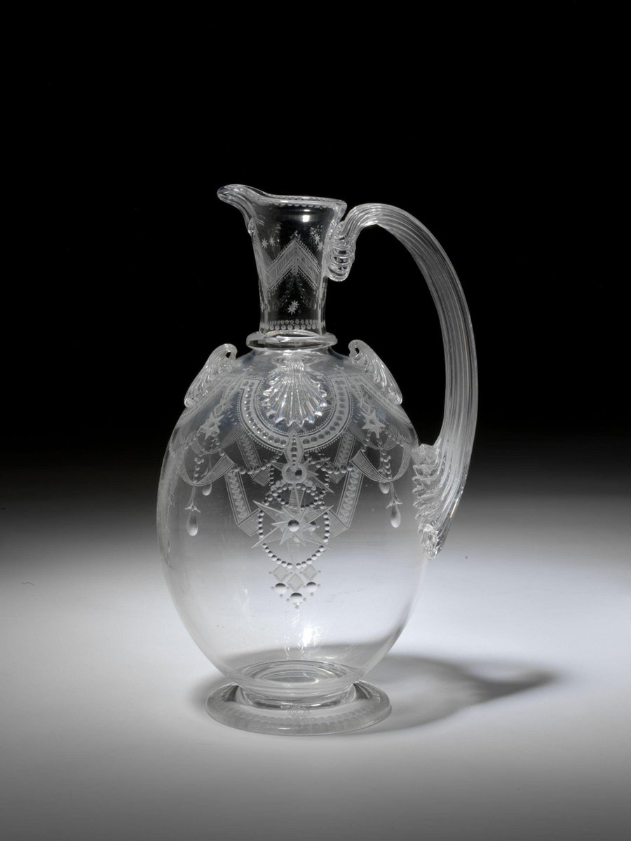 wikivictorian's tweet photo. Ewer, engraved/acid-etched glass, decorated with jewelled swags, Thomas Webb, England, 1867. Victoria &amp; Albert Museum. https://t.co/bH20LD711X