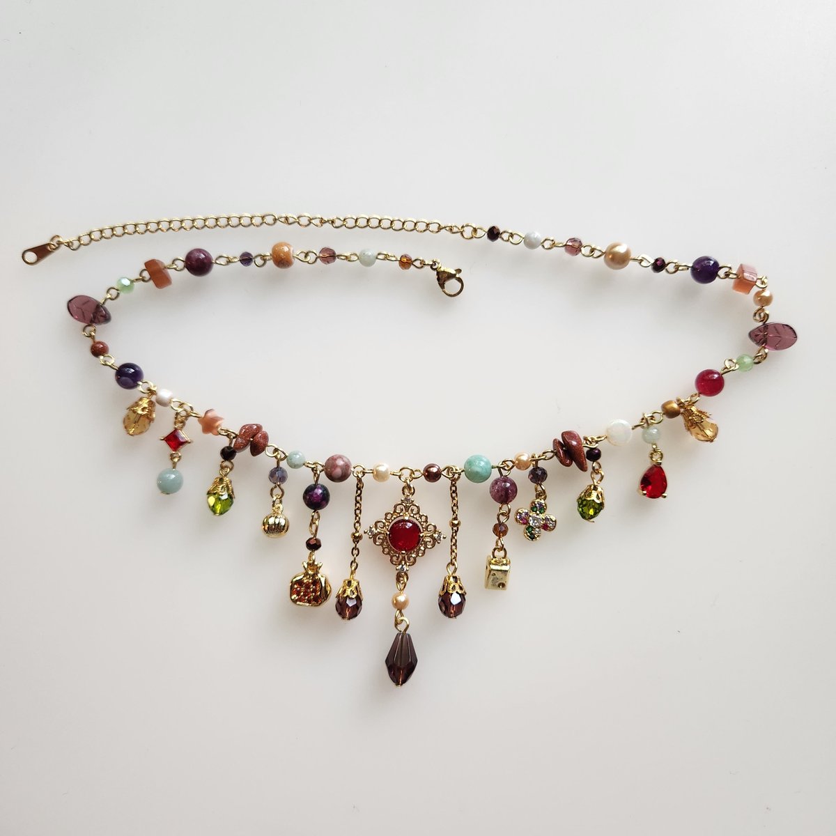 pondsizedocean's tweet photo. made a necklace inspired by a charcuterie board https://t.co/pZGxUFt1v0