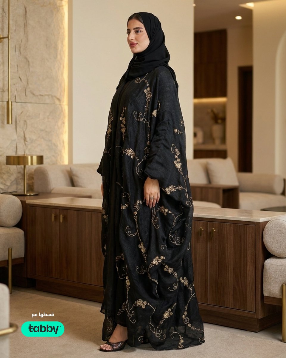 NafisaShamStore's tweet photo. في #اليوم_الوطني_السعودي، تألقي بطلّة تجمع بين الهيبة والأناقة مع عباية البشت السوداء الملكية، في تصميم يجمع بين أصالة البشت العربي ورُقي التطريز الذهبي الفاخر على الأكمام والحواف.

 احصلي عليها الآن من #متجر_نفيسة_شمس وتأنّقي بحضور لا يُشبهه أحد:
 https://t.co/4eYz9MmNll https://t.co/HPybejQdJf