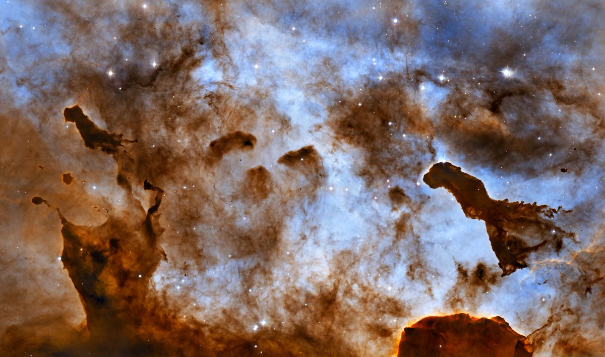 WorldAndScience's tweet photo. Sculpted by the stars themselves...

These immense pillars of cold gas and dust in the Carina Nebula have been shaped by fierce stellar winds.

(Credit: NASA, ESA, and the Hubble Heritage Project (STScI/AURA); Acknowledgment: M. Livio and N. Smith) https://t.co/M0ND3YN1iU