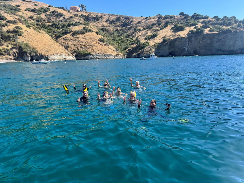 Students enjoying an evening of snorkeling at the USC Wrigley Marine Science Center after a long and hot day exploring the geology of Catalina Island.