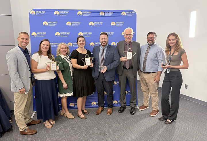 Representatives from Siegel High, Smyrna Middle, Blackman Elementary and Rutherford County Schools showcase the awards received by the United Way