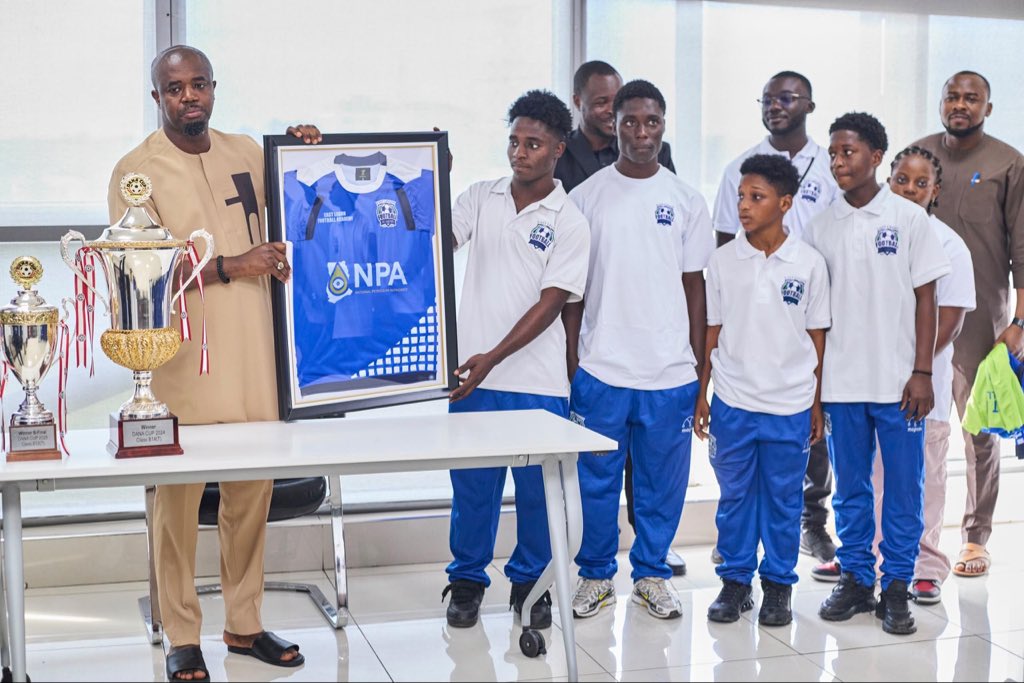 NPAGhana's tweet photo. East Legon Football Academy Commends NPA for Supporting Youth Development Through Football

The East Legon Football Academy has commended the National Petroleum Authority (NPA) for its support towards youth development through football.
This follows the Authority’s contribution to the Academy’s participation in international football competitions and development programmes in Denmark and Spain.

The support enabled the Academy’s young footballers to travel to Denmark to participate in the prestigious Dana Cup competition, where the team has competed for the past four years. 
The Academy has enjoyed notable success at the tournament, with its Under-14 boys’ team winning the trophy in 2024, followed by the U-12 boys’ team in 2025.

The young footballers also travelled to Spain for scout trials with Rush SPF Academy in Madrid. During their visit, the team toured the Santiago Bernabéu and Metropolitano Stadiums, home grounds of Real Madrid and Atlético Madrid respectively, and participated in training sessions with football academies in Spain.

The Academy expressed its appreciation to the NPA during a visit to the Authority to formally demonstrate its gratitude for the support earlier today.

The Chief Executive Officer of the NPA, Mr. Godwin Kudzo Tameklo, Esq., acknowledged the Academy’s achievements and commended the young footballers for their courage, discipline and commitment to pursuing excellence through football.

He noted that it was encouraging to see young footballers demonstrate the discipline and determination required to compete at the international level.

As a gesture of appreciation, the Academy presented the NPA CEO with a citation and a personalised football jersey in recognition of the Authority’s support and contribution to the development of young footballers in Ghana.

The NPA’s support for the East Legon Football Academy forms part of its commitment to contributing to national development through its Corporate Social Responsibility (CSR) activities.

Visit https://t.co/HDajXgfqeu for more updates.