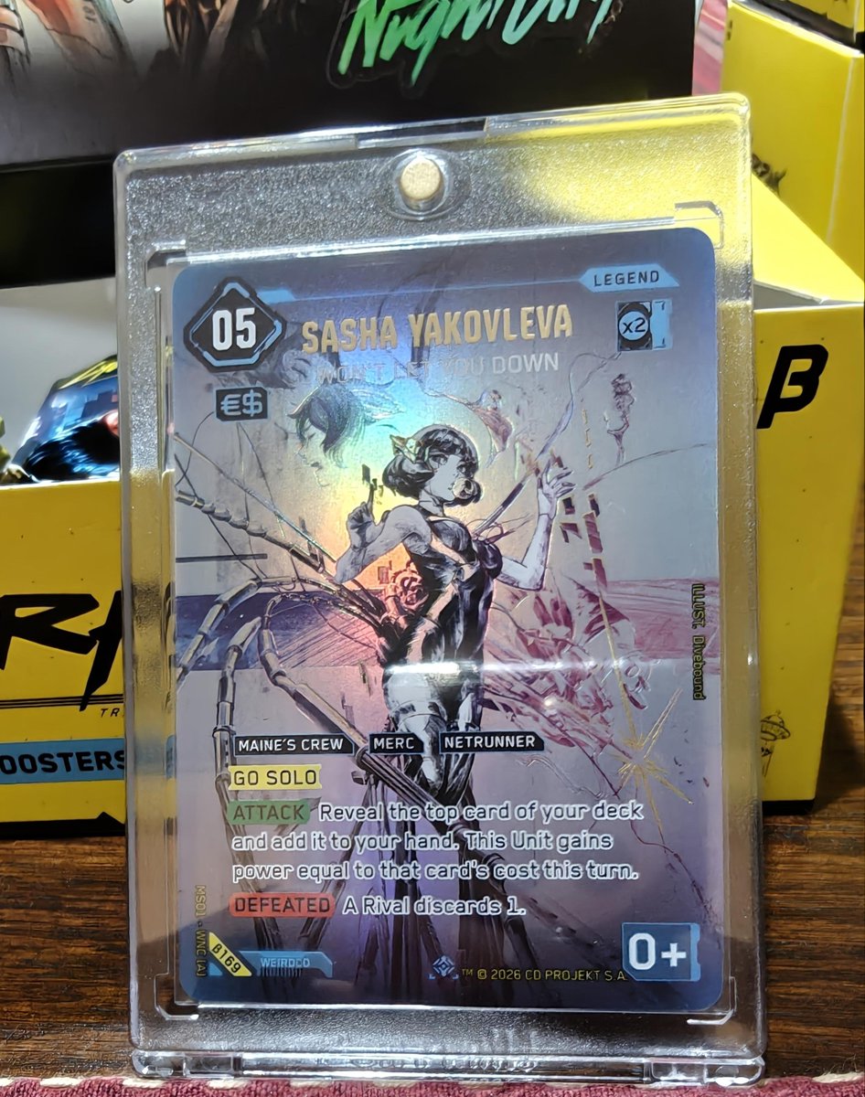 Adonis_Allan's tweet photo. Cyberpunk TCG Card of the Day🌆
Sasha Yakovleva: Won't Let You Down - Iconic Secret Rare ✨ 👀
Blue Legend Unit with Go Solo.
When she attacks, you reveal the top card of your deck and put it in your hand. She gets +power equal to that card’s cost for the rest of the turn (so a cost 4 draw makes her a 4 that fight).
When she’s defeated, a rival discards 1 card.
#CTCG
